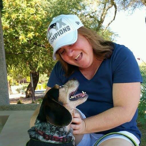 Woman petting a dog